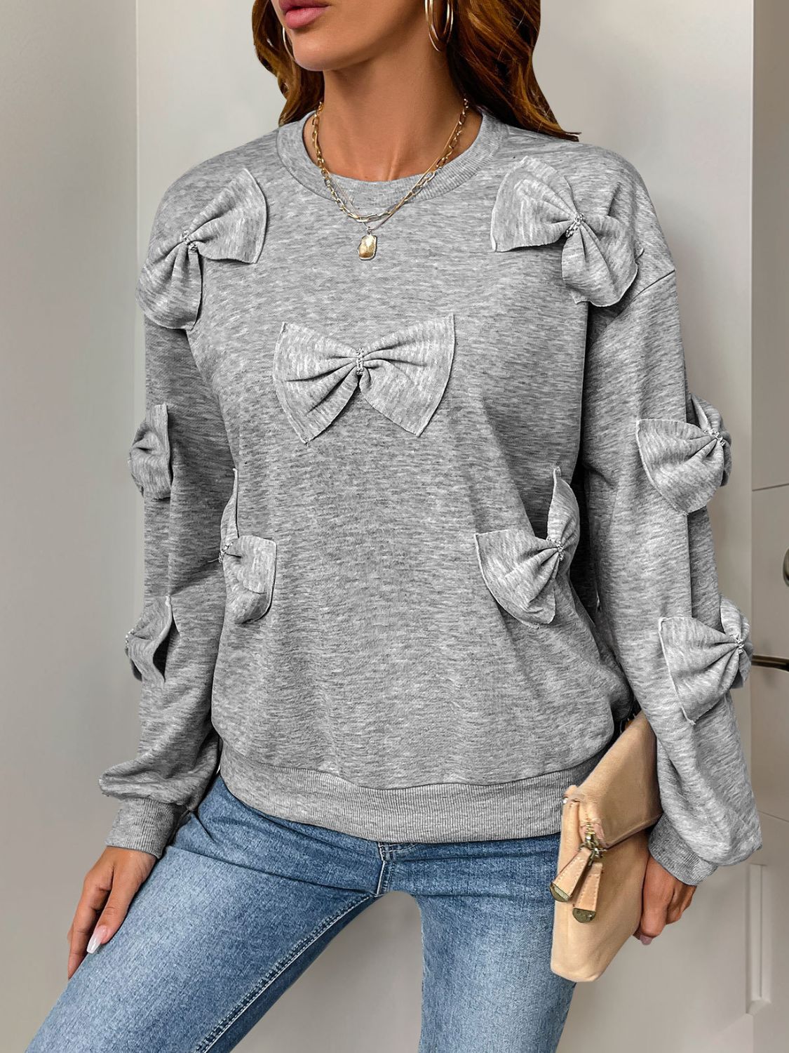 Perfee Bow Round Neck Long Sleeve Sweatshirt Trendsi