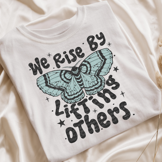 We Rise By Lifting Others Graphic T-Shirt Gunpowder and Lace Boutique Nac