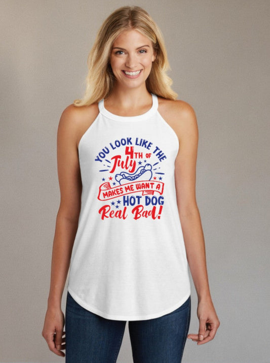 A woman in a white tank top with a festive 4th of July message in red and blue, including an illustration of a hot dog, designed for summer celebrations